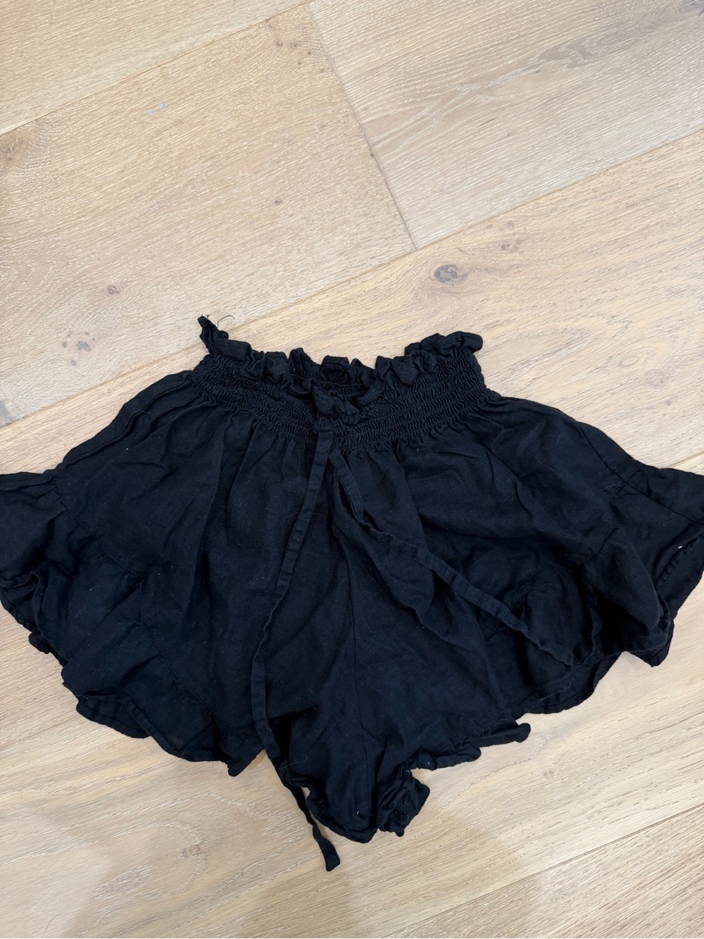 Montce Black Smocked Ruffle Waist Shorts